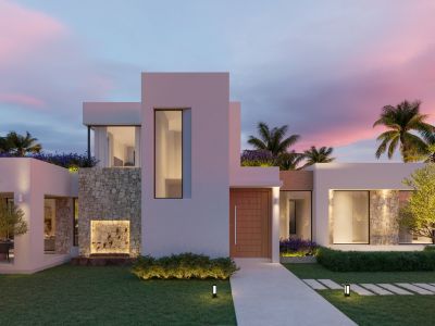 Moderne villafaçade bij schemering met witte muren, natuurstenen bekleding, houten deur en verlicht tuinpad met waterornament.