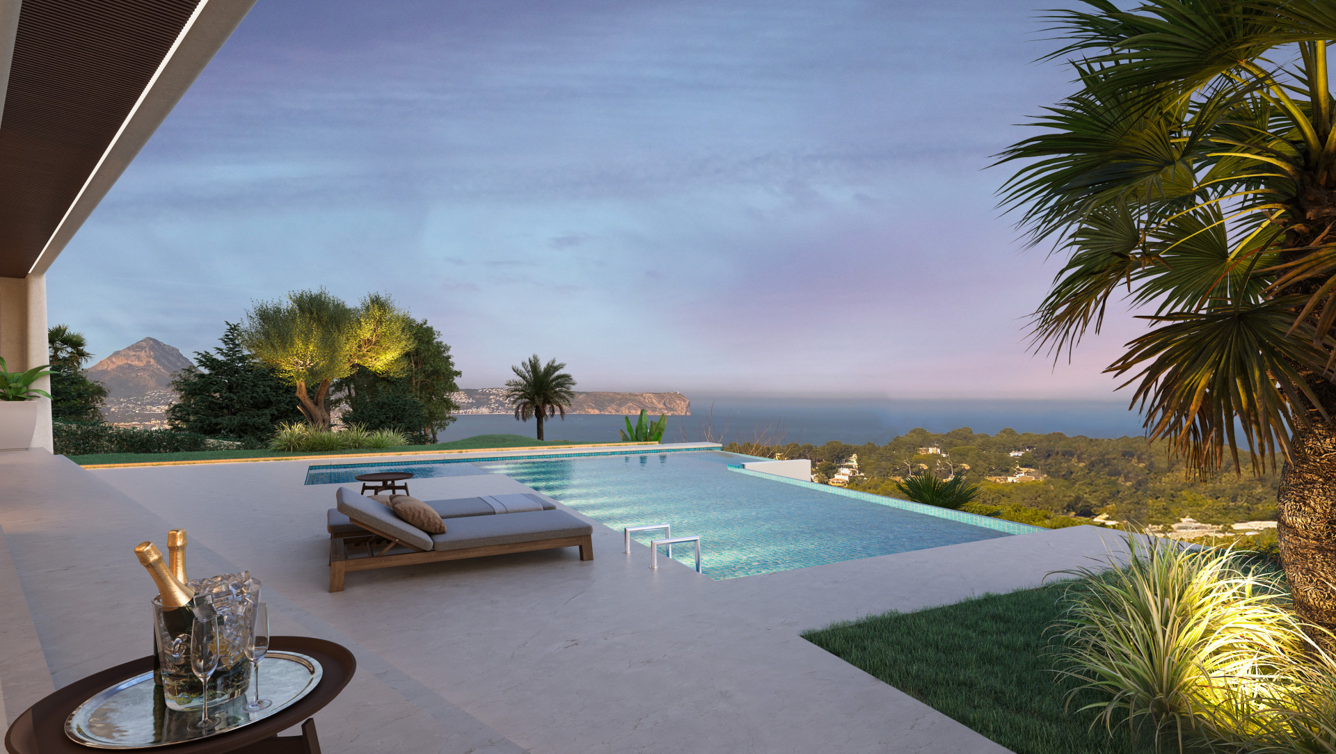 Uitzicht op het overloopzwembad met ligbedden, tuin en uitzicht op zee en de bergen bij zonsondergang in Jávea.