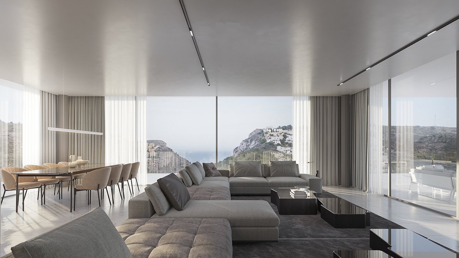 Open woon- en eetkamer met kamerhoge ramen die een panoramisch uitzicht bieden op de kust, ingericht met minimalistisch meubilair in neutrale tinten.