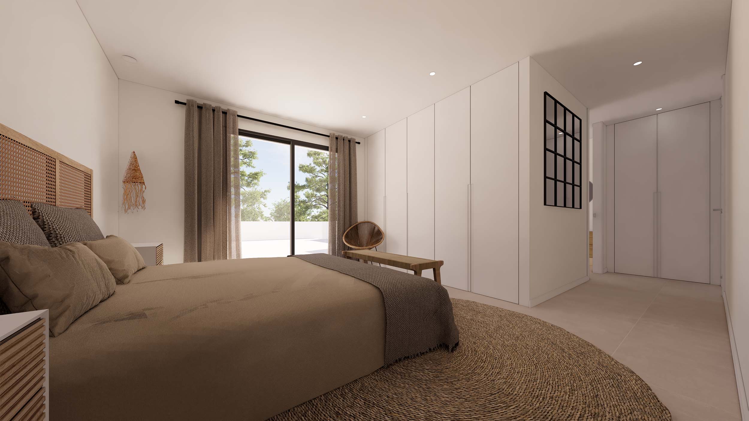 Slaapkamer in Ibiza-stijl met kamerhoge inbouwkasten, rotan hoofdbord en directe toegang tot het terras via grote schuifdeuren.