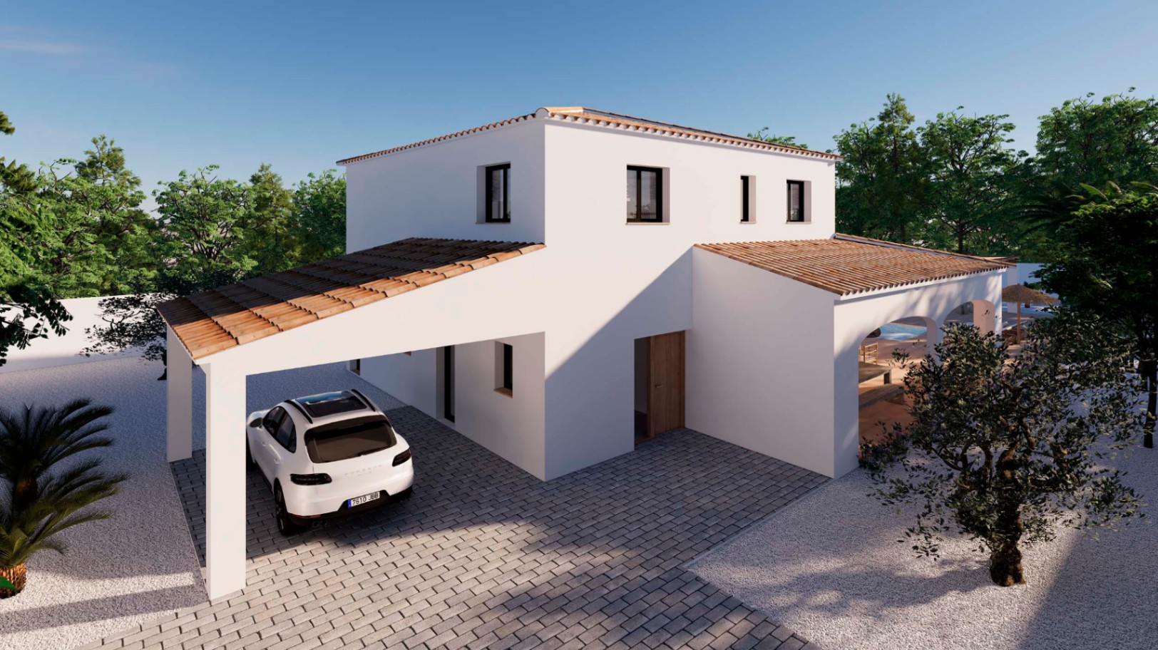 Buitenaanzicht van de witte villa met traditionele dakpannen, een overdekte carport en een bestrate oprit omgeven door een mediterrane tuin.
