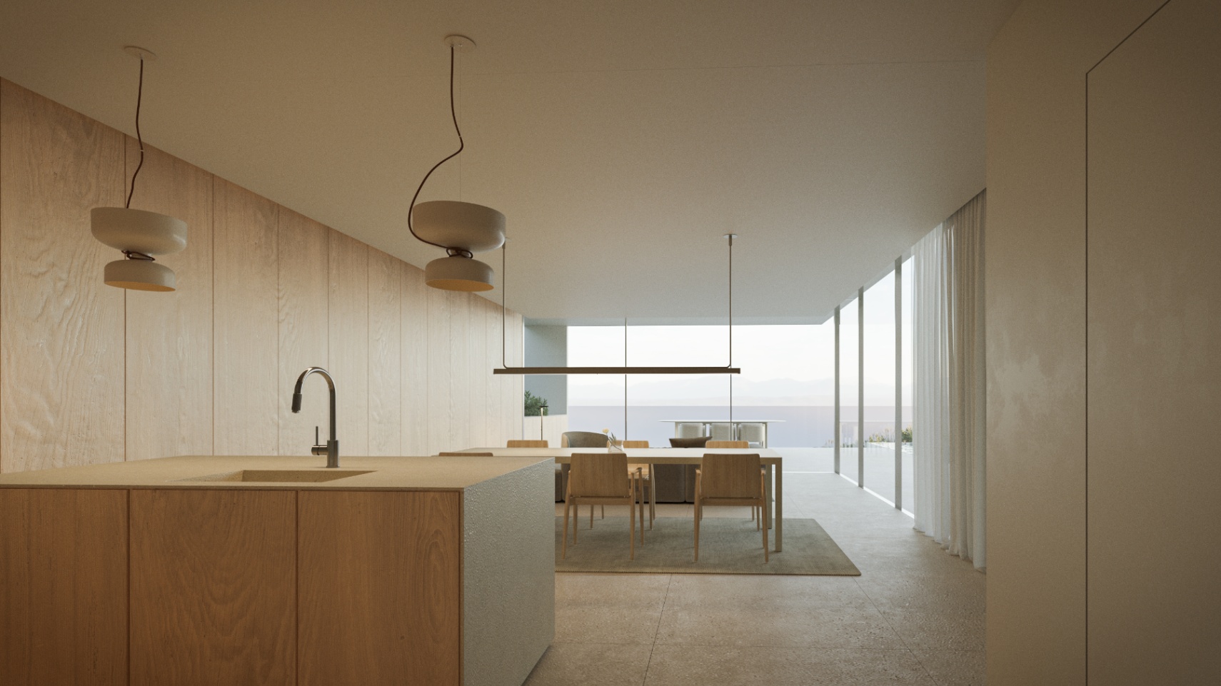 Designkeuken met houten eiland geïntegreerd in een open woonruimte, voorzien van minimalistische verlichting en kamerhoge ramen met uitzicht op zee.