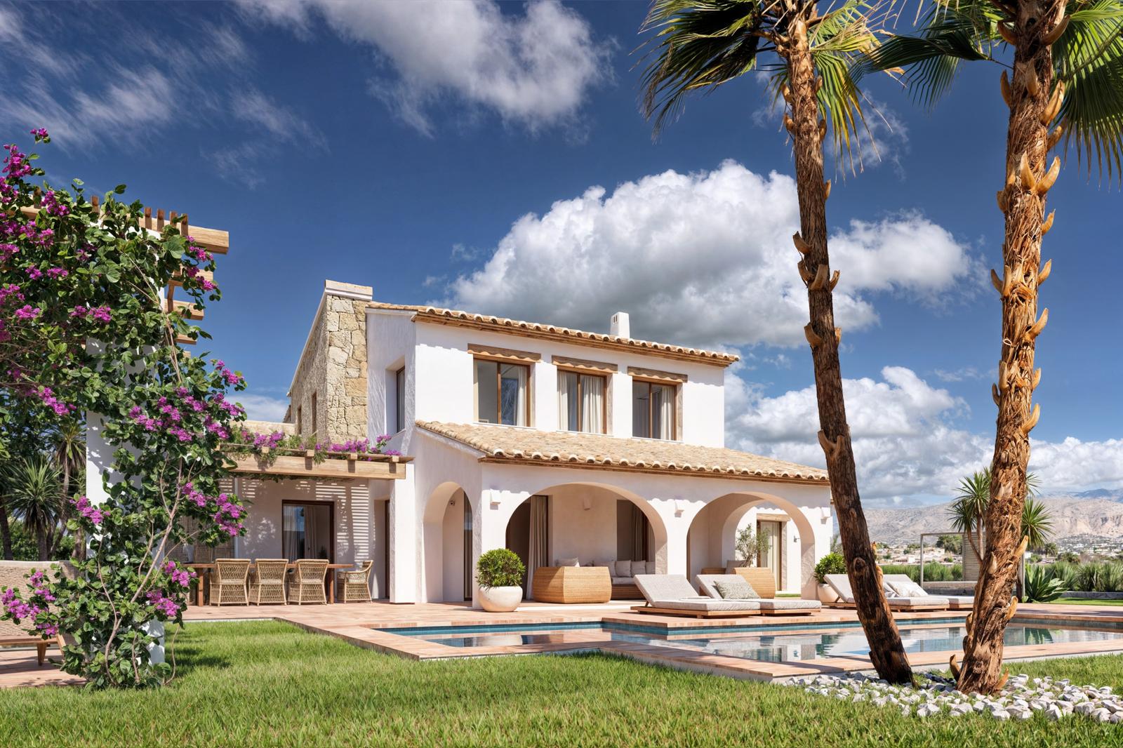Exterieur van de villa met een boogvormige veranda, zwembad en eethoek onder een houten pergola met bougainville, omgeven door natuurstenen muren en palmbomen.