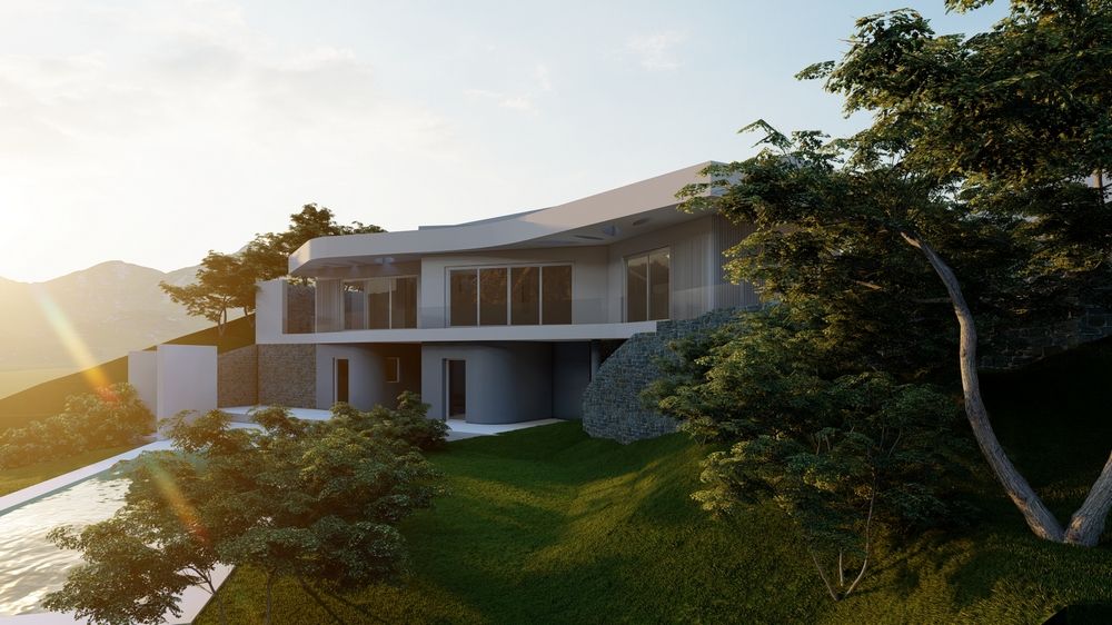 Exterieur van de moderne villa met gebogen daklijnen, natuurstenen muren en grote raampartijen op een terrasvormig perceel met volgroeide bomen.