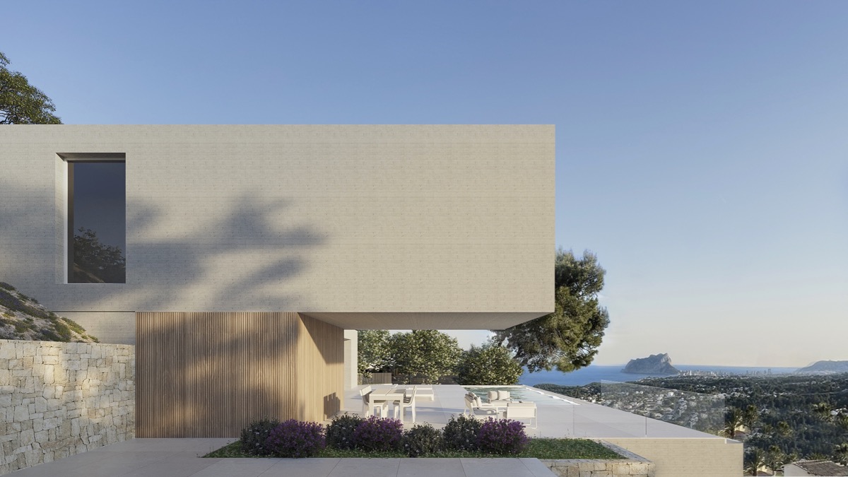 Minimalistische gevel met architectonisch overstek, houten accenten en terras met overloopzwembad. Panoramisch uitzicht op zee en de Peñón de Ifach.