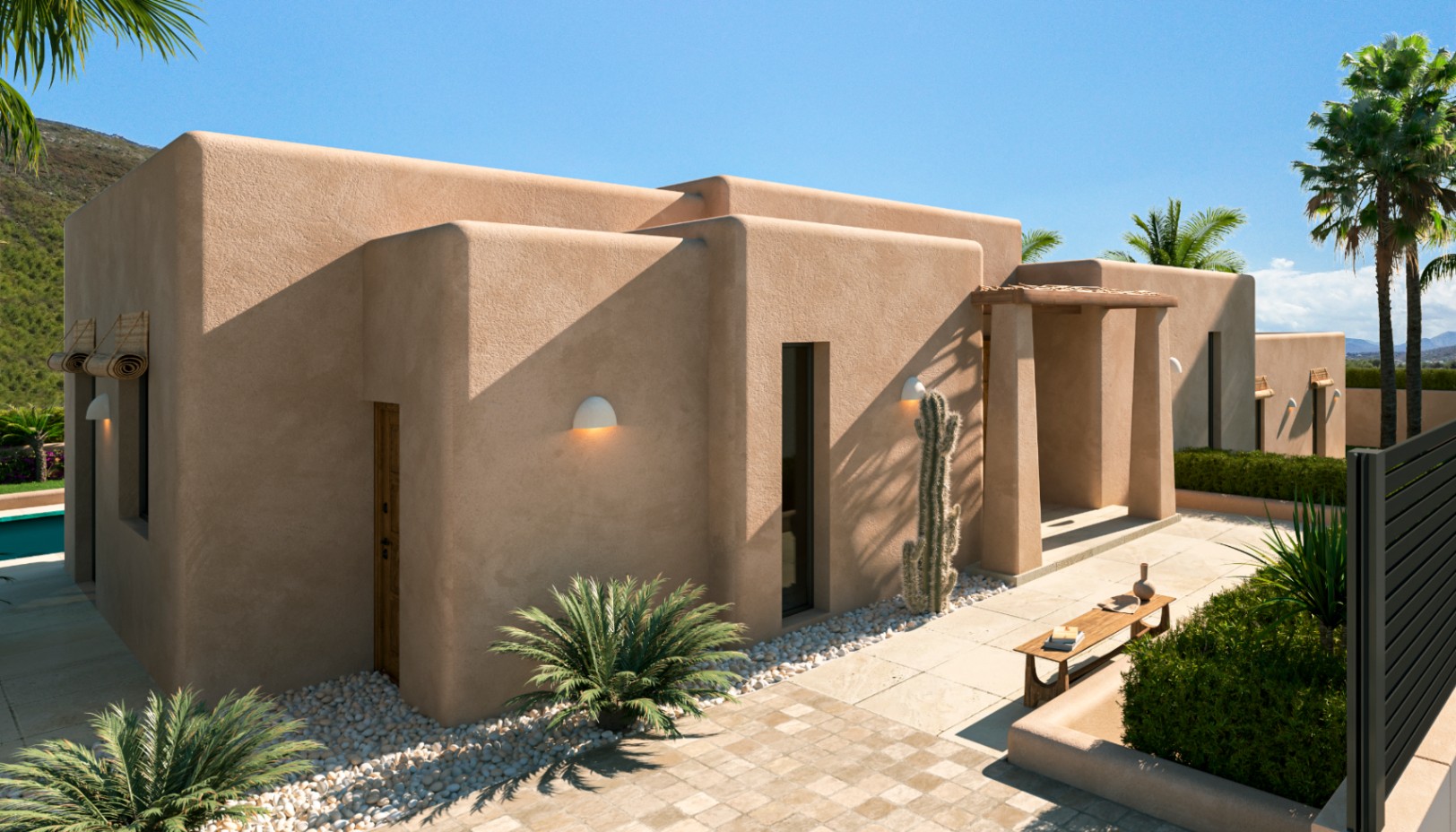 Eigentijds mediterraan exterieur met aardetinten, afgeronde hoeken en een onderhoudsvriendelijke tuin met cactussen en palmen langs natuurstenen paden.