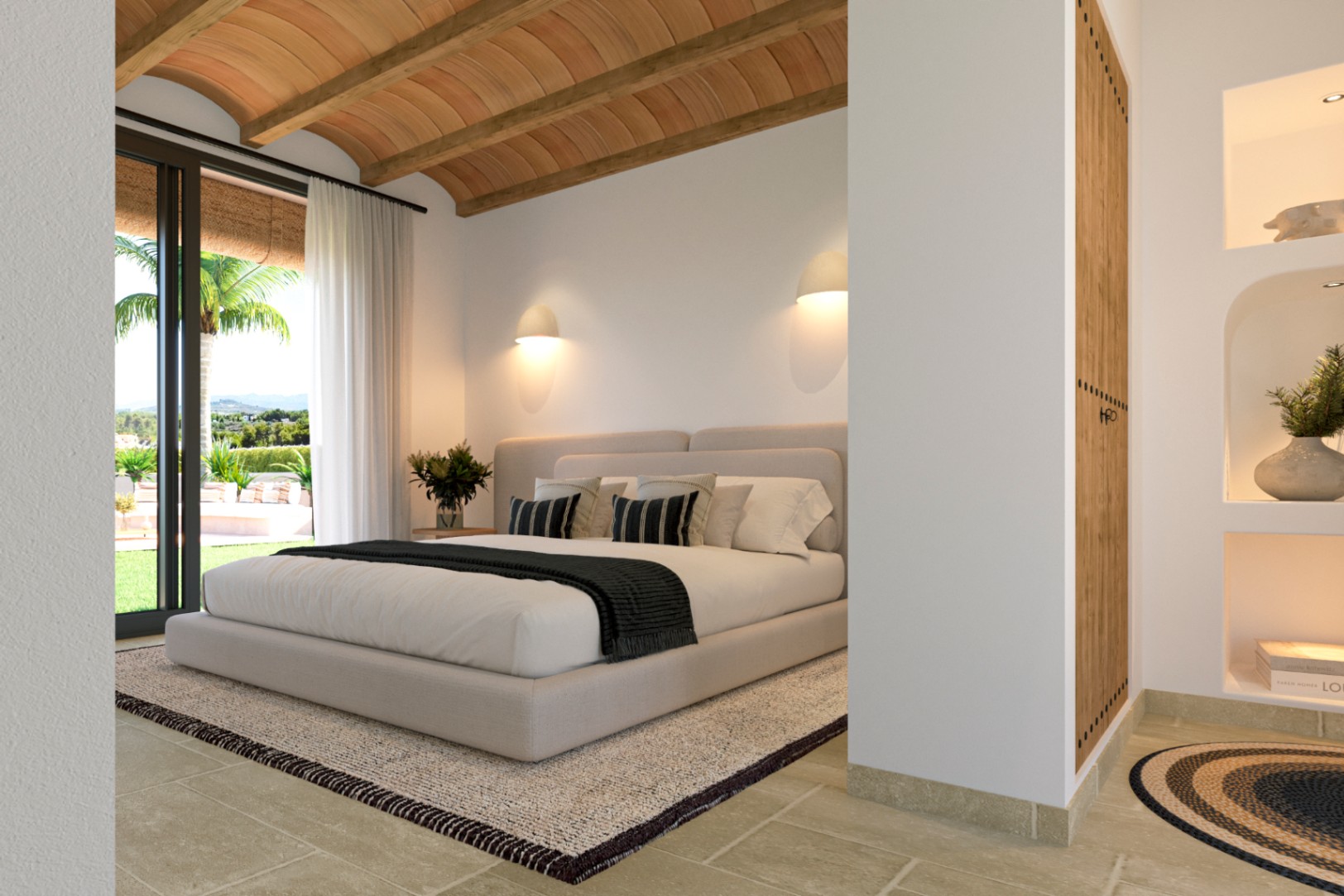 Hoofdslaapkamer met een traditioneel gewelfd plafond met houten balken, natuurstenen vloer en directe toegang tot de tuin via schuifdeuren.
