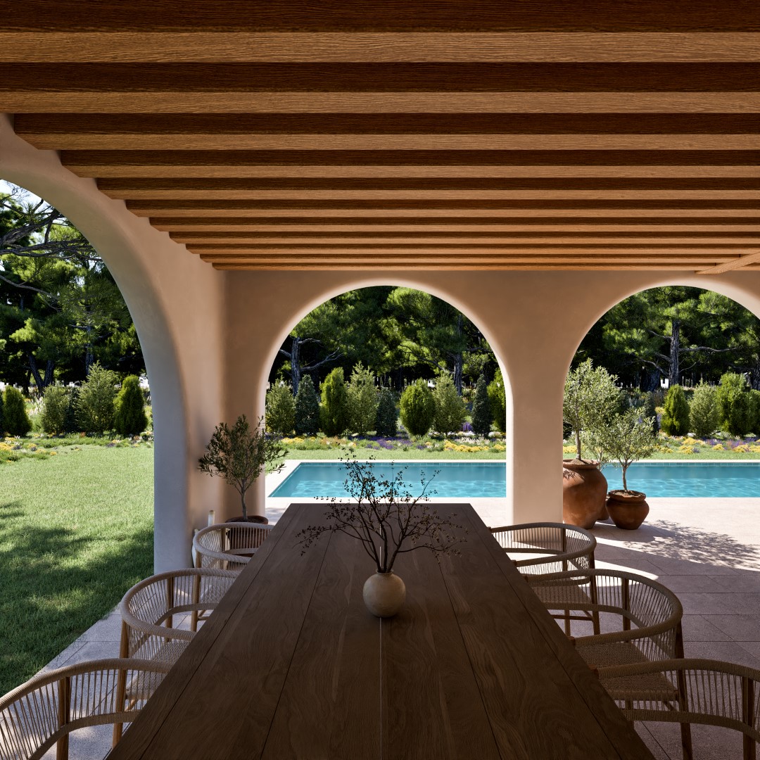 Mediterrane naya met bogen, een houten balkenplafond en een eethoek buiten met uitzicht op het privézwembad en de tuin.