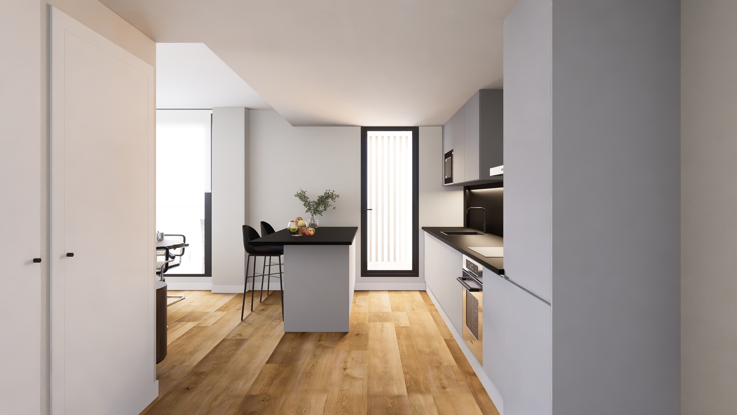 Moderne open keuken met grijze kasten, zwarte werkbladen en een kookeiland. De lichte houten vloer zorgt voor een warme uitstraling in deze strakke, lichte ruimte.