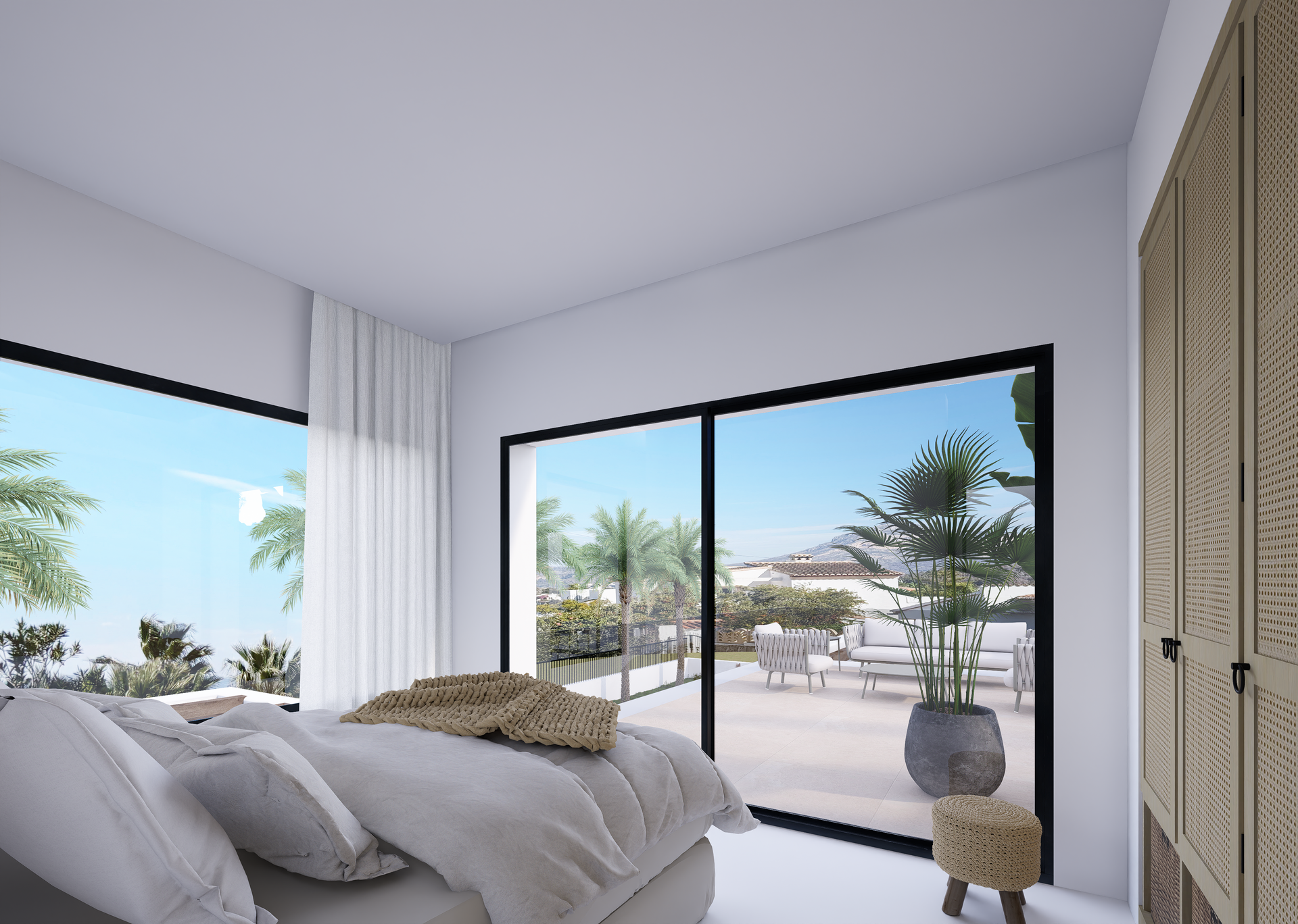 Moderne slaapkamer met kamerhoge schuifdeuren die toegang bieden tot het terras. Inclusief inbouwkasten met rotan panelen en uitzicht op de berg Montgó.