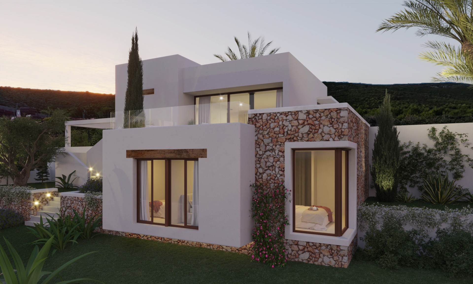 Exterieur van een moderne villa met twee verdiepingen, natuurstenen muren en witte gevels. Grote raampartijen en glazen balustrades sieren de verlichte tuin bij zonsondergang.