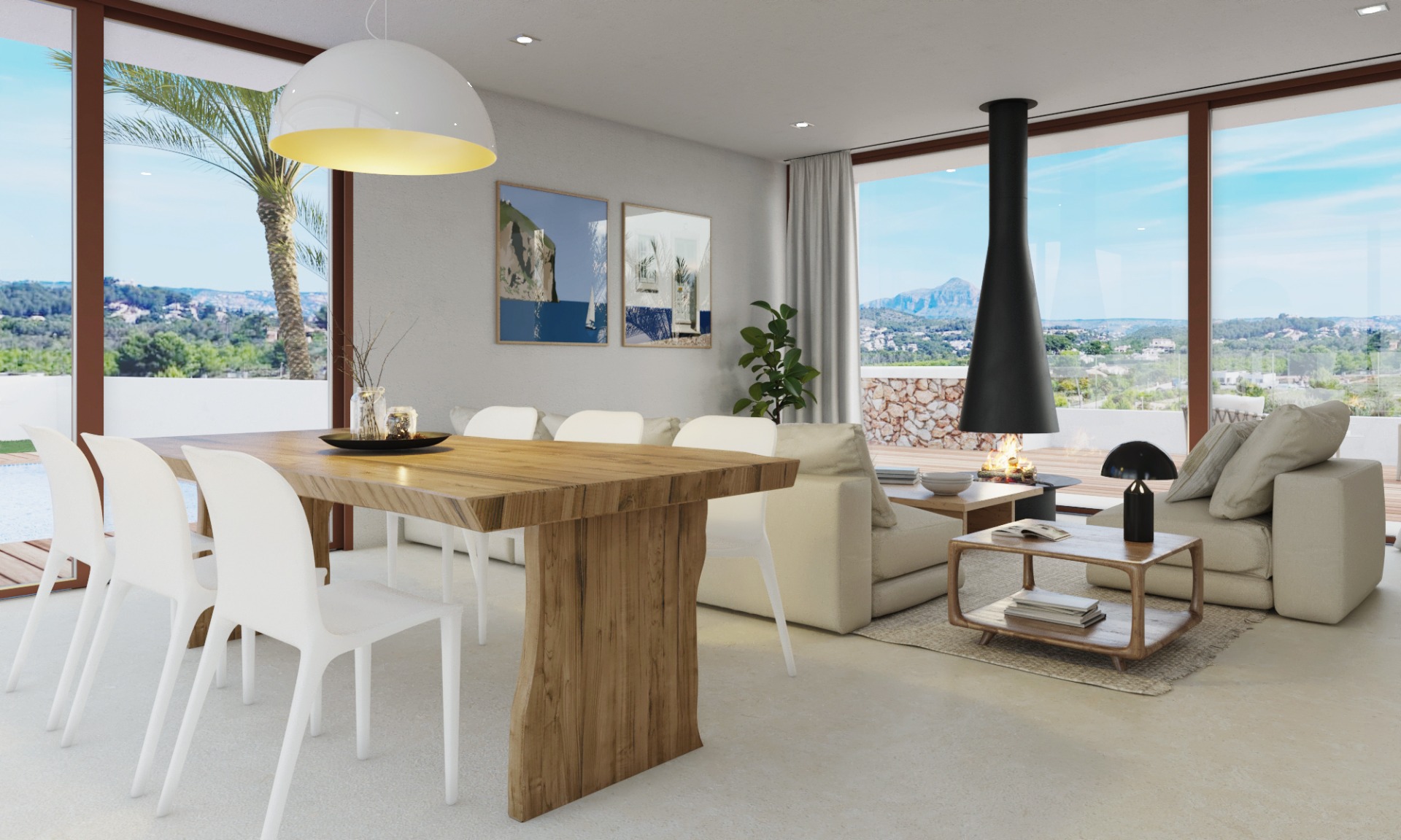 Open woon- en eetkamer met een natuurlijke houten tafel, een hangende designhaard en grote glazen puien met uitzicht op de Montgó en het landschap.