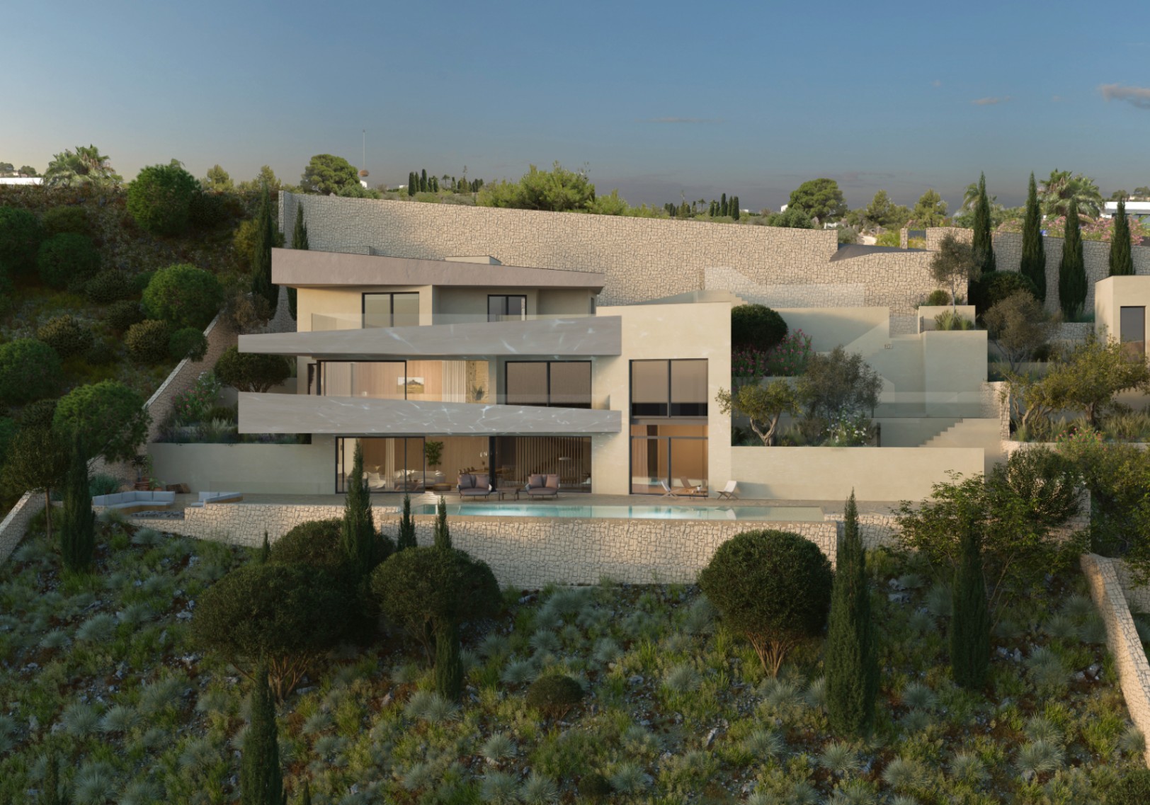 Buitenaanzicht van de villa in Benissa. Modern design met zwembad en ruime terrassen geïntegreerd in het landschap.